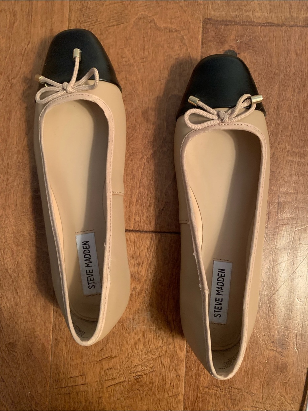 Steve Madden Beige Flats with Black Cap Toe and Bow